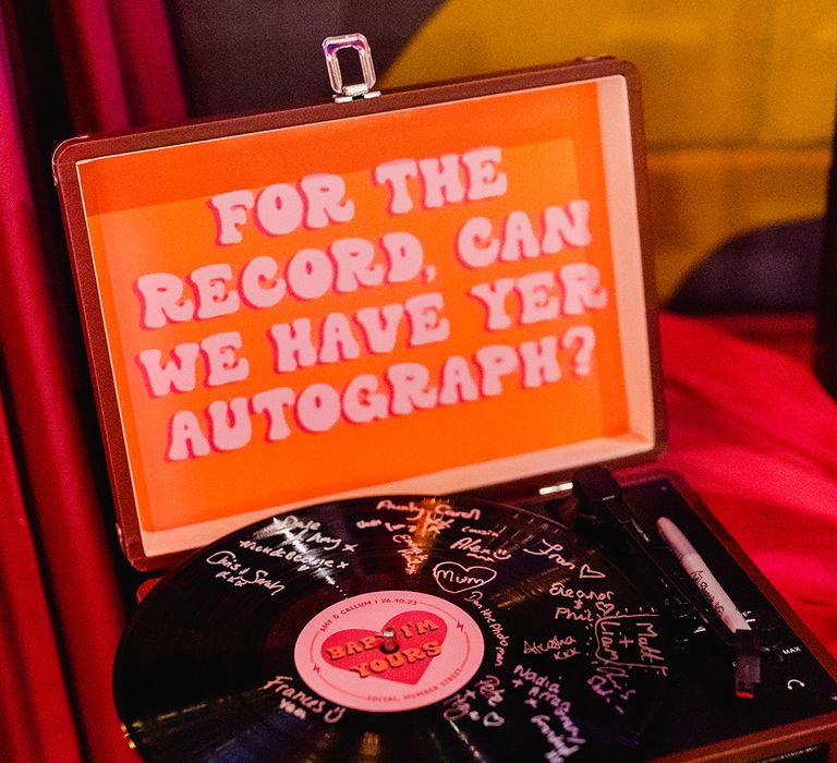 Vinyl record wedding guestbook idea for the music themed wedding 