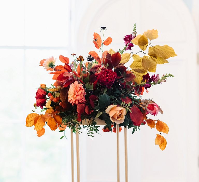 Tall autumn wedding flower arrangement 