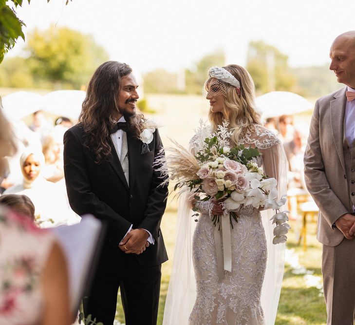 Outdoor wedding ceremony at The Lost Orangery 