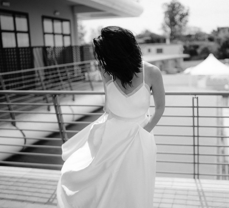 Bride on a balcony in bridal separates 