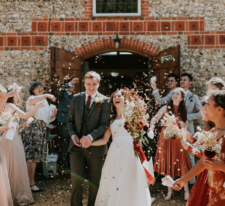 bride and groom confetti exit 