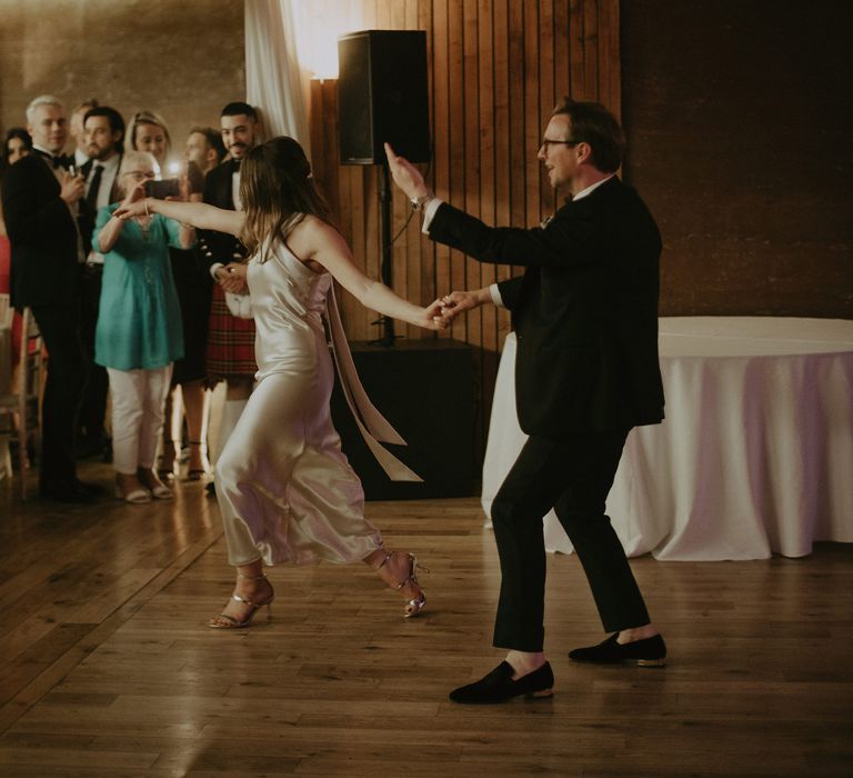 Bride & groom dance on their wedding day during reception