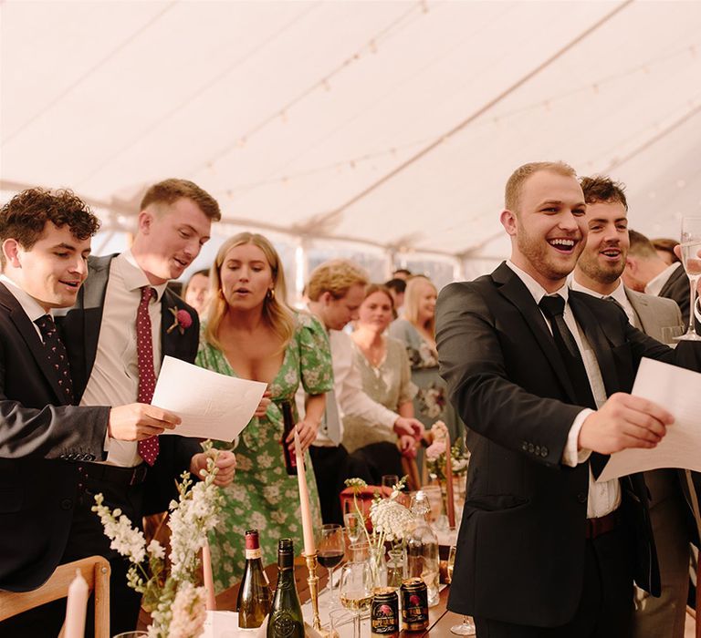 Guests toast the happy couple