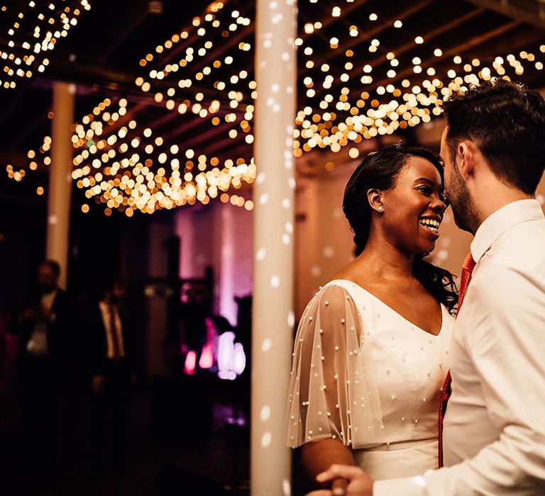 First dance under a canopy of fairy lights at 100 Barrington wedding venue in London 