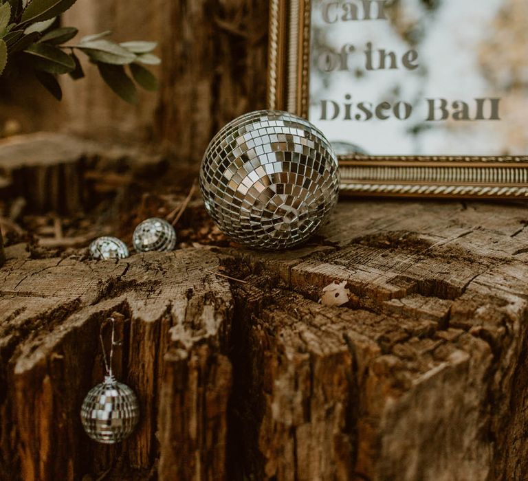 Disco ball rests on wooden block