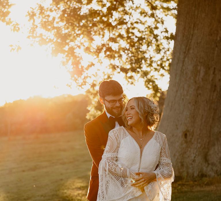 Sunset golden hour cute couple portrait