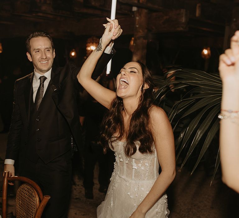 Bride sings during her reception with rave theme 