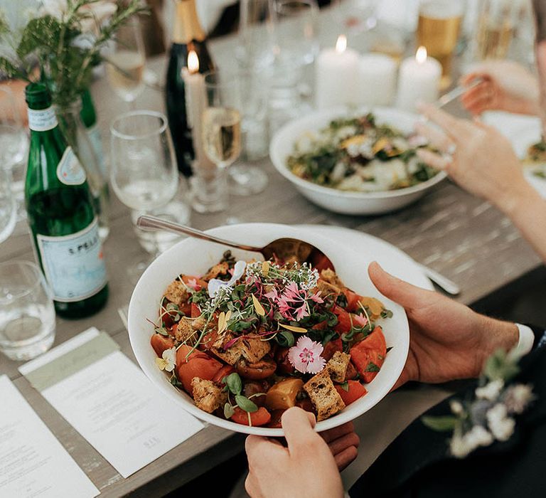 Colourful wedding catering complete with edible flowers