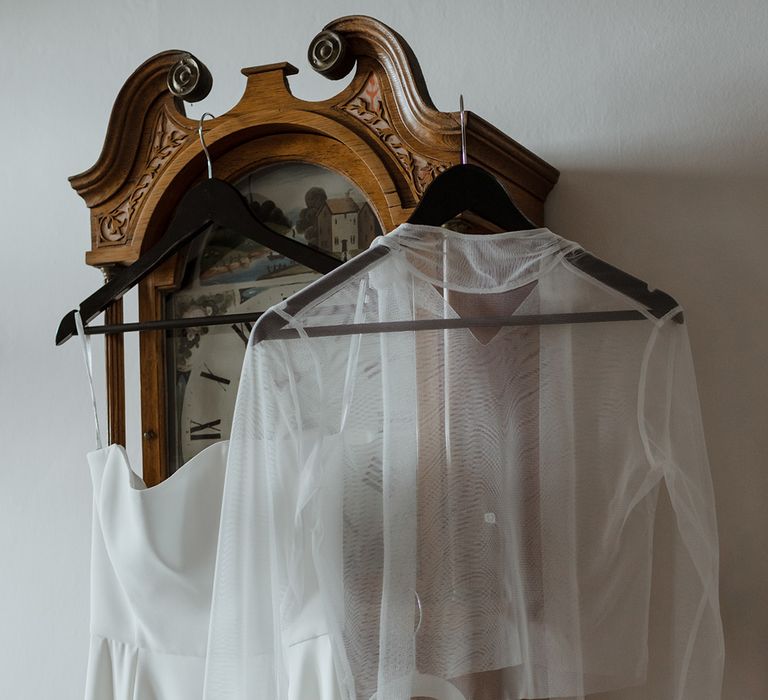 The bride's Jessica Bennett wedding dress with veil and mesh overlay top 