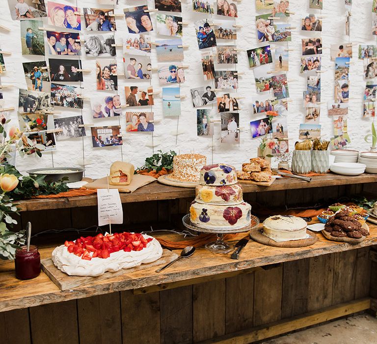 Wedding dessert table with homemade desserts by the guests 