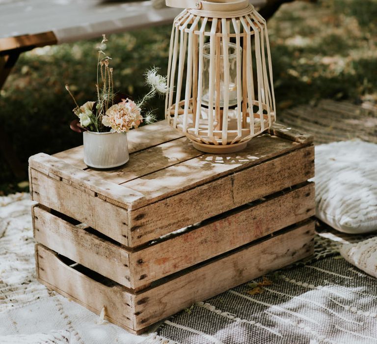 Wooden crate and bamboo lantern wedding decor 