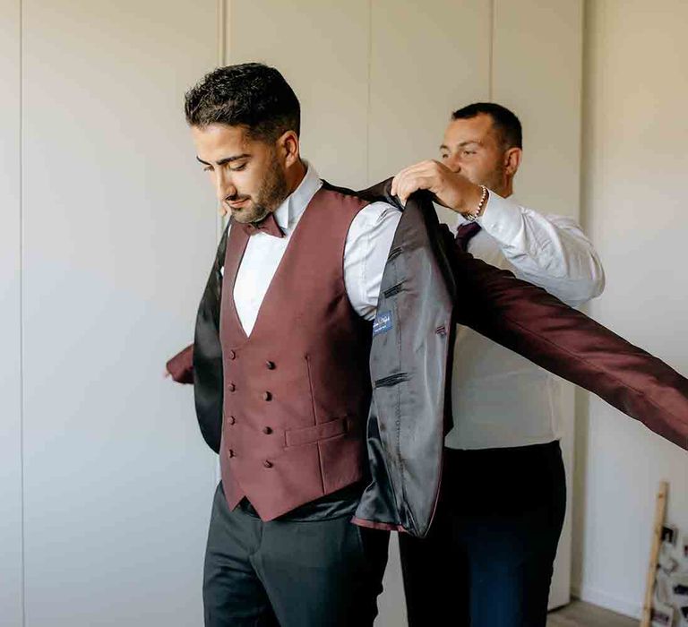 Groom preparations for destination wedding