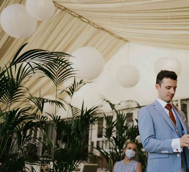 Groom waiting for bride at Lusty Glaze wedding