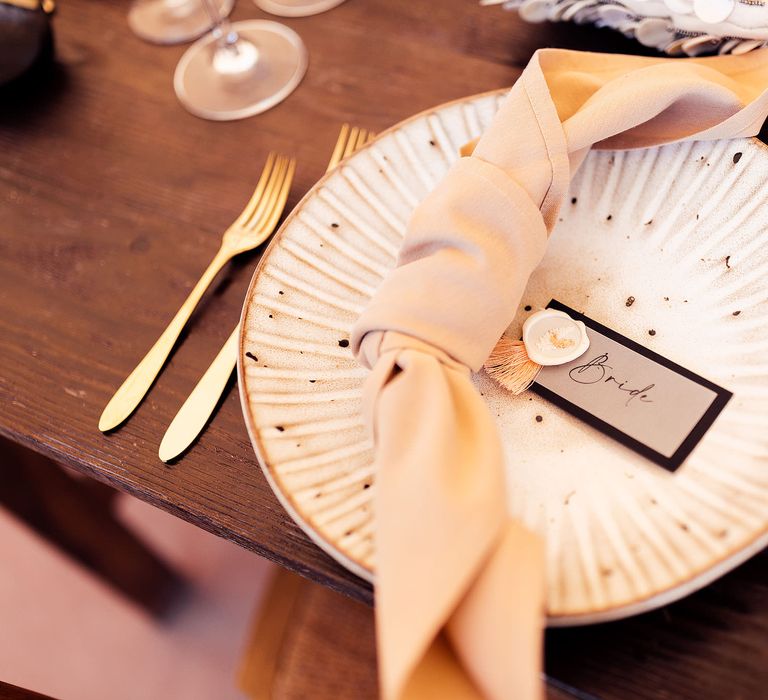 Wedding place setting with linen napkin