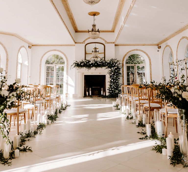 Northbrook Park wedding ceremony decorated with green and white flowers and candles 