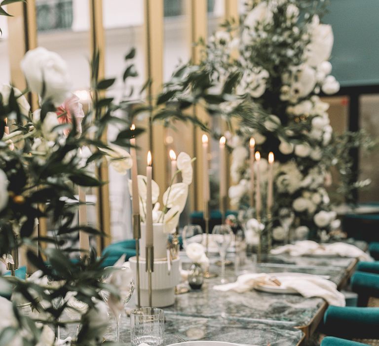 Minimalist Paris elopement wedding table decor with white flower, candles and acrylic stationery 