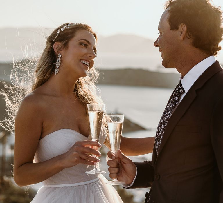 Bride & groom look lovingly at one another on their wedding day