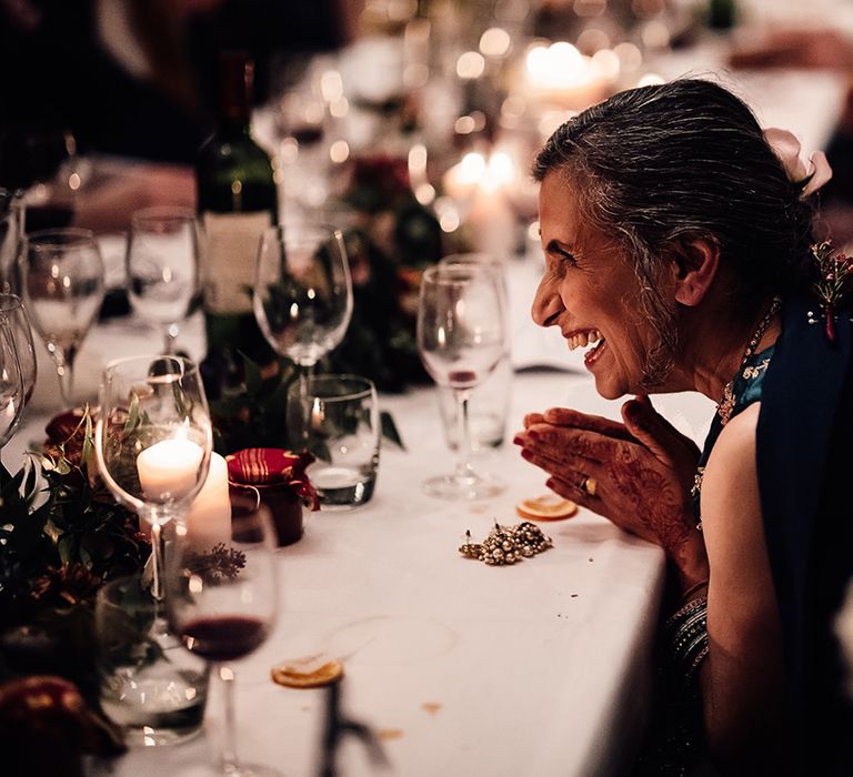 White table cloths, smiles, foilage & smiles at Minley Manor