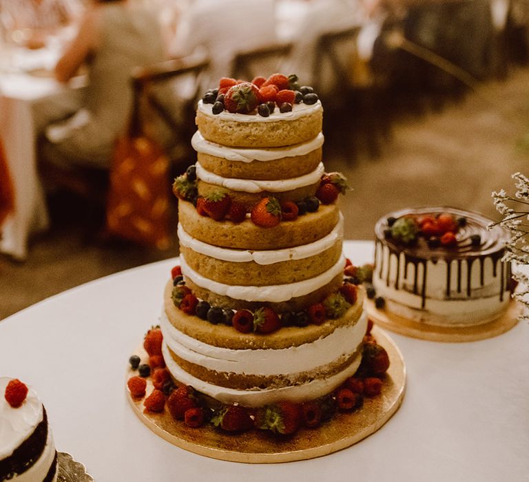 Naked wedding cake with berries