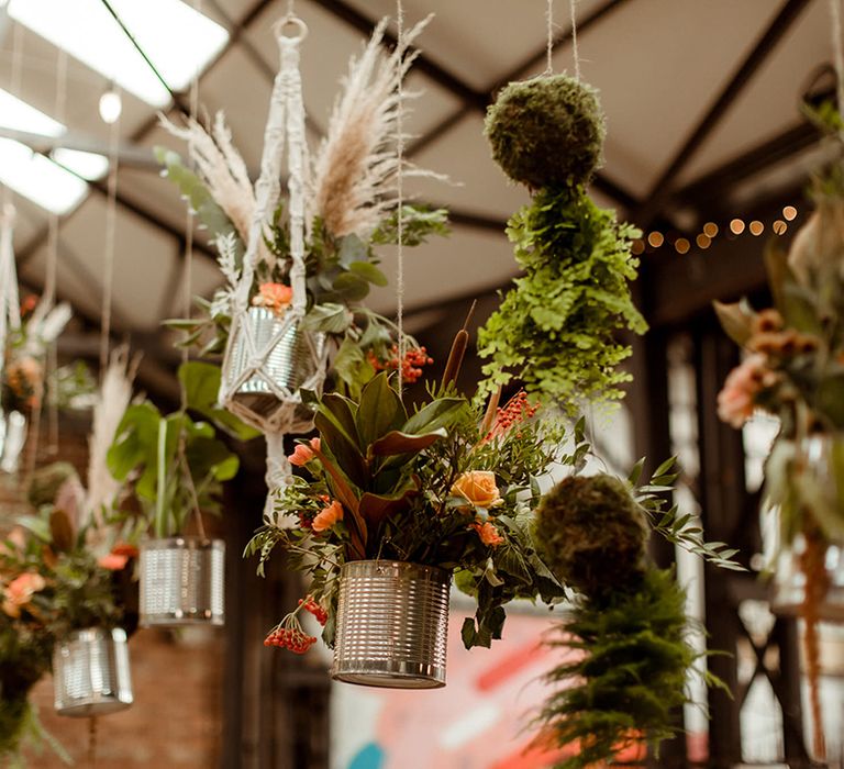 DIY hanging plant decor for warehouse wedding venue for industrial boho vibes 