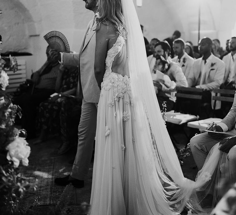 Bride and groom stand for the wedding ceremony 