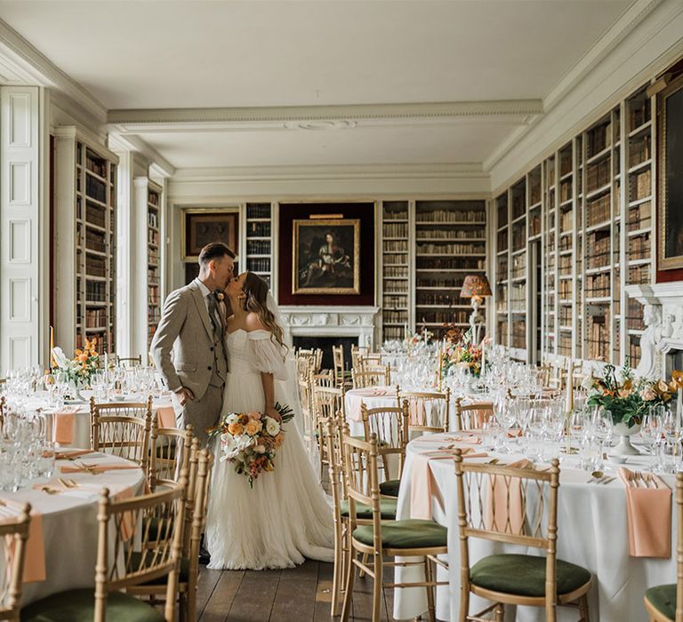 St Giles House county house wedding venue with library decorated for the wedding breakfast 