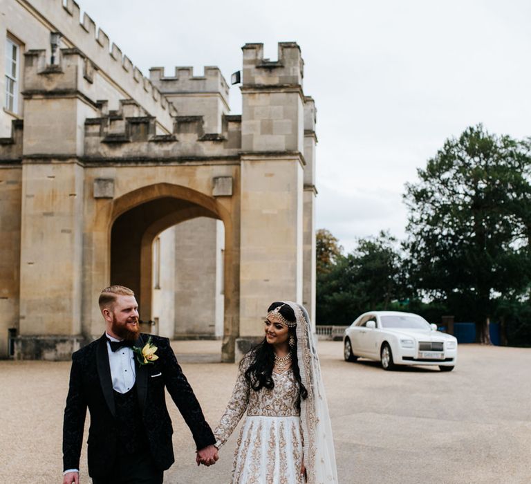 Syon Park wedding with the bride in a silver embellished wedding outfit