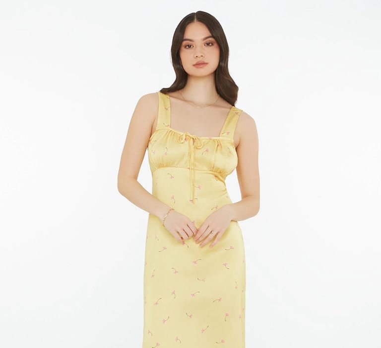 Butter yellow bridesmaid dress from Omnes 