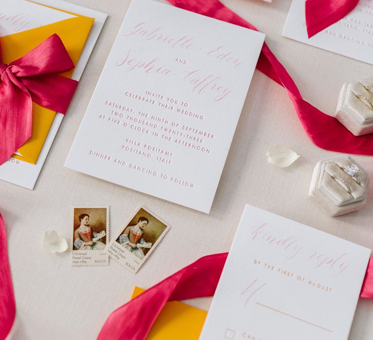 Bright pink ribbons with pink and white wedding stationery suite 