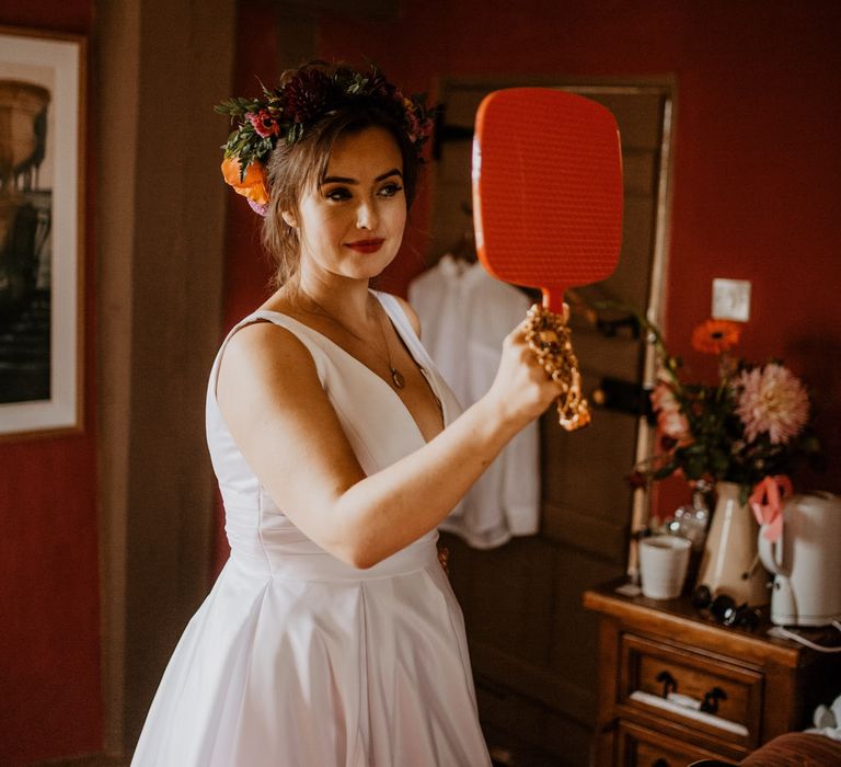 bride on wedding morning with flower crown 