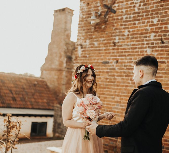 Bride and Groom on their wedding day with Blush Tulle Wedding Dress