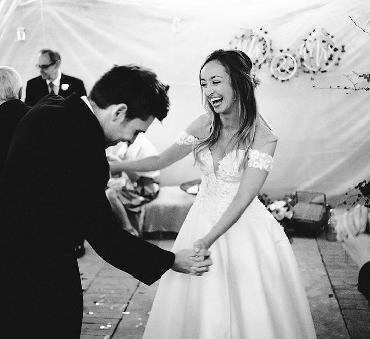 Couples first dance at countryside barn wedding