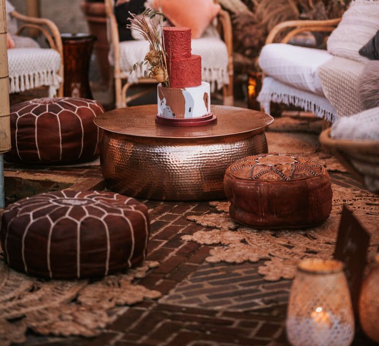 Comfy leather cushion seating at boho wedding reception