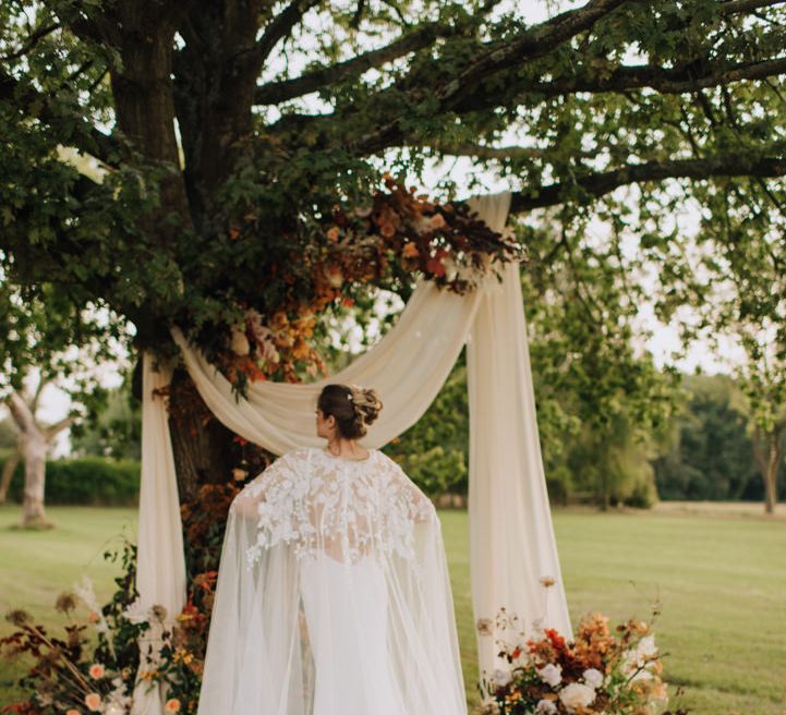 Amazing bridal cape at Reymerston Hall