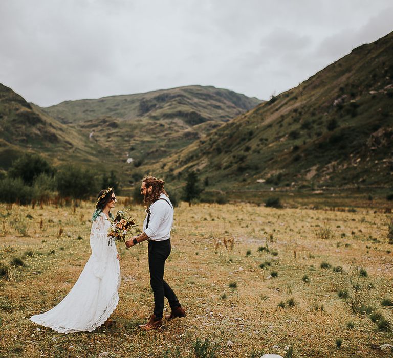 Bride & groom outside in the Lake District after wedding ceremony