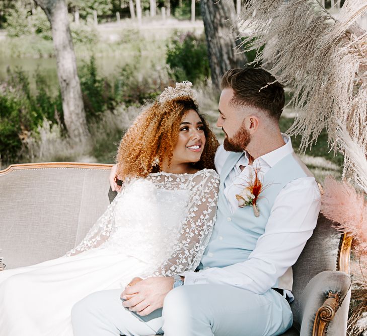 Bride leans into groom on their wedding day 