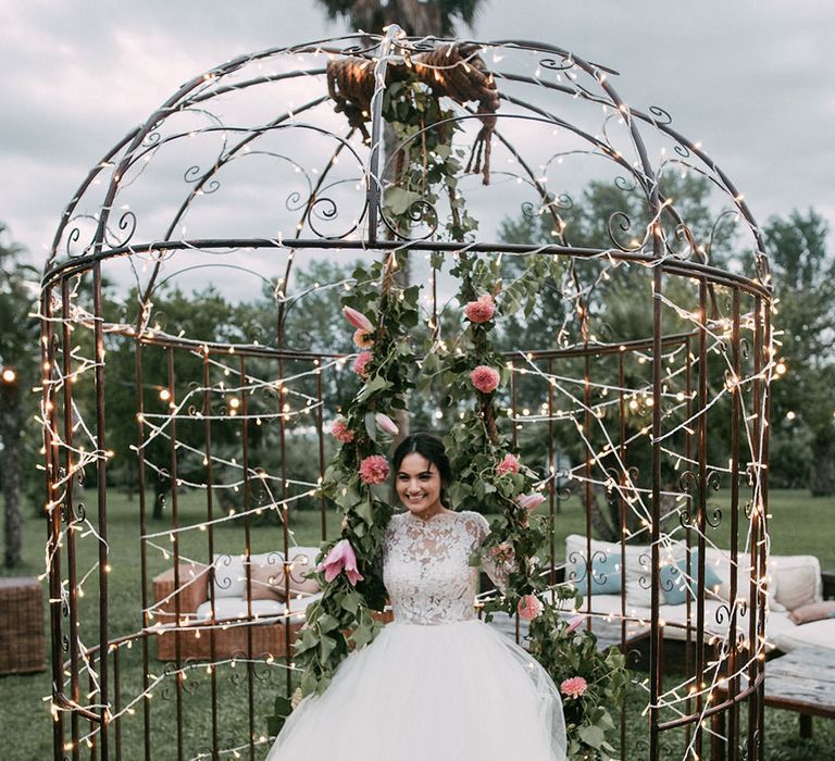 Huge tulle skirt princess wedding dress with long sleeves and lace detail by Sara Lobla Photography