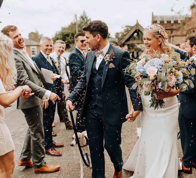 Confetti moment for bride and groom 