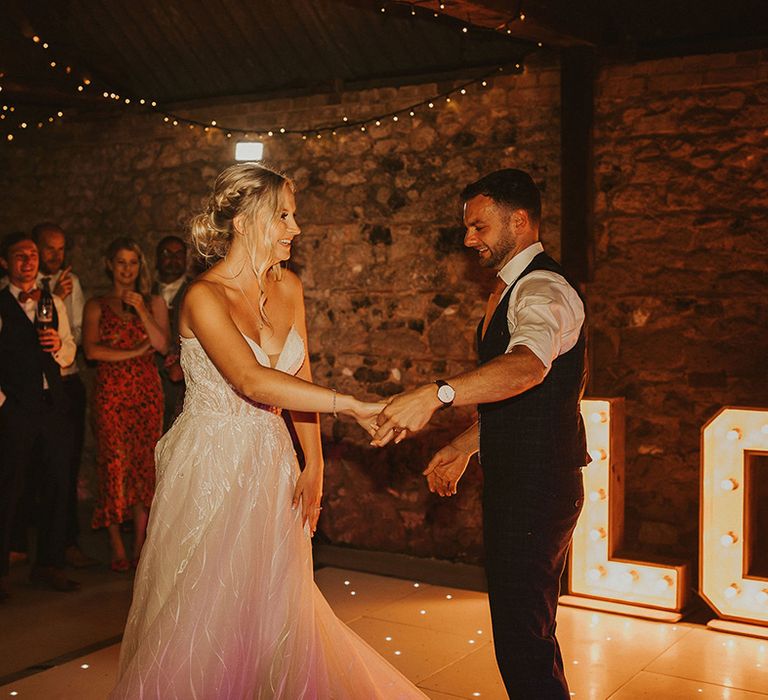 Bride and groom first dance at East Afton Farmhouse wedding