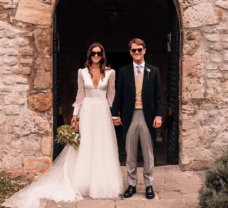 Bride and groom wearing sunglasses wedding accessories for fun and colourful wedding 