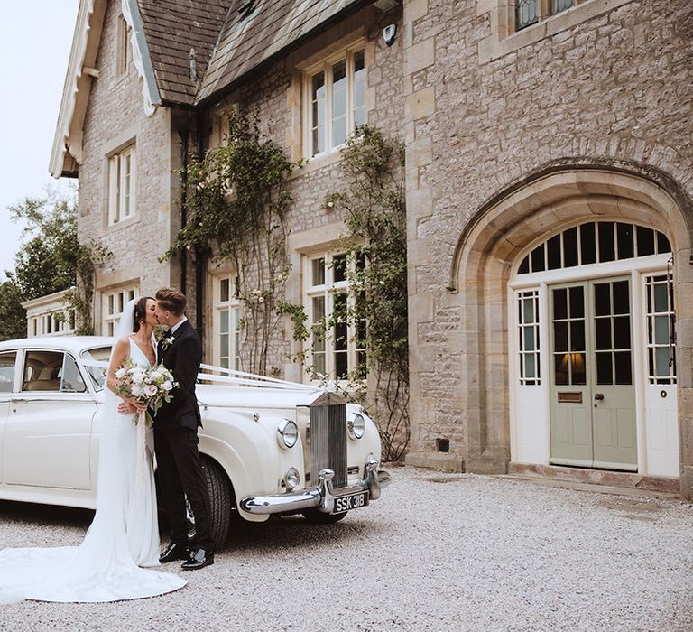 Vintage Rolls Royce wedding car for the bride and groom's classic luxe country house wedding venue 