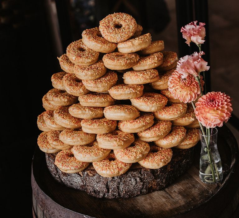 Iced sprinkle ring doughnut tower alternative to wedding cake 