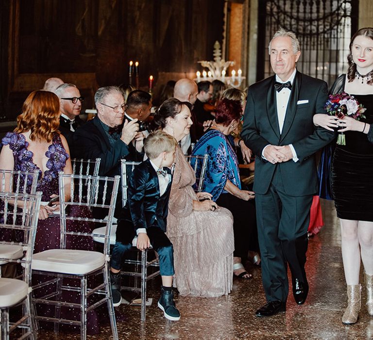 Wedding guests wearing all black wedding outfits for the romantic gothic ornate wedding in Venice 