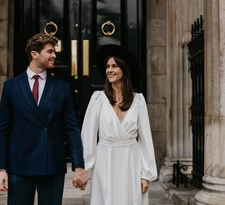 Stylish Bride and groom at intimate wedding 