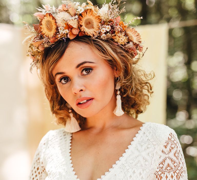 Bride wearing floral crown in Longton Wood 