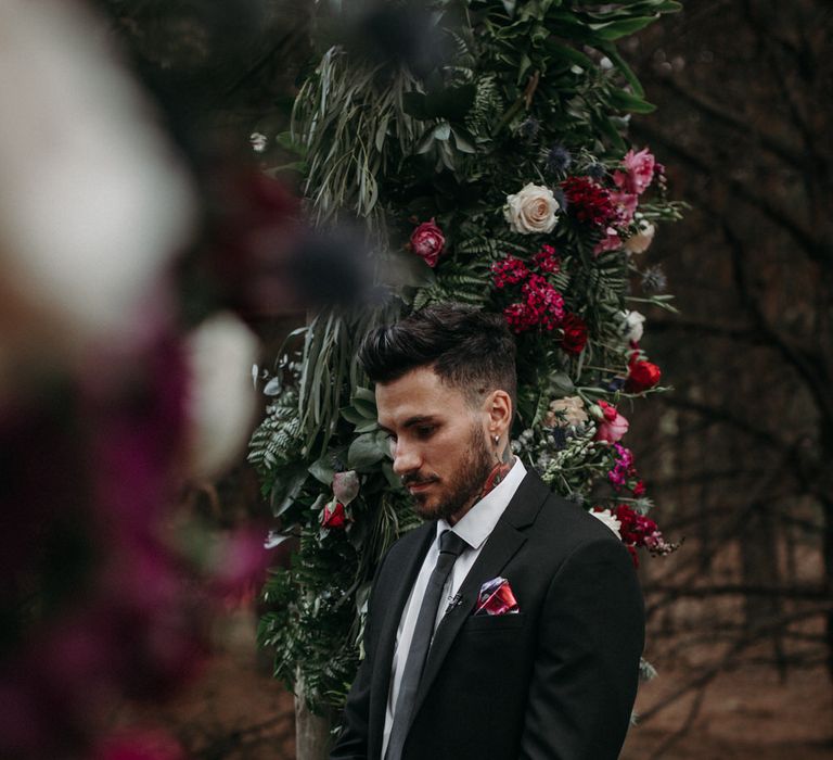 Groom waiting at the altar for the bride