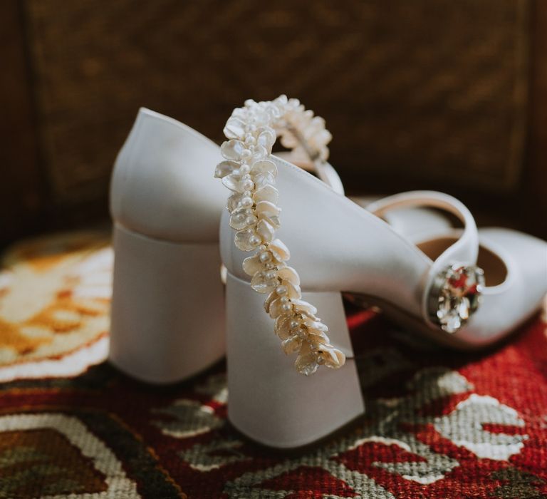 Bridal accessories with white block heel Mui Mui wedding shoes and floral headband 