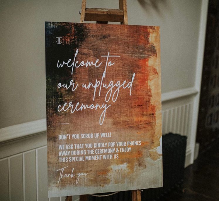 Contemporary and modern painting complete with personalised unplugged ceremony signage 