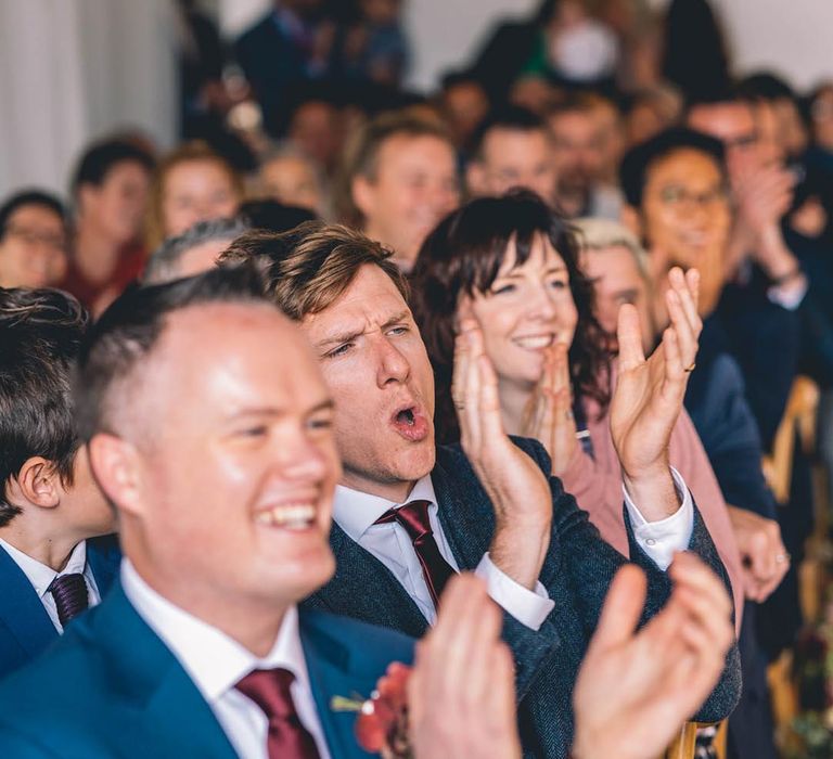 Wedding guests cheer at London wedding