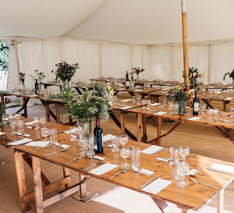 Rustic interior of tipi for wedding reception